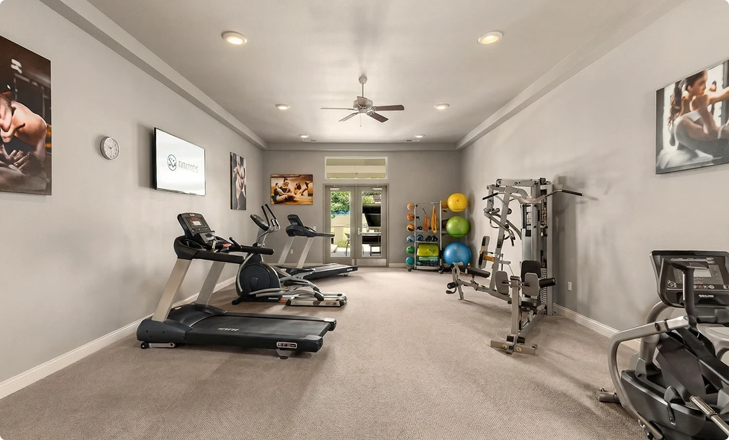 On-site fitness center with cardio and strength equipment