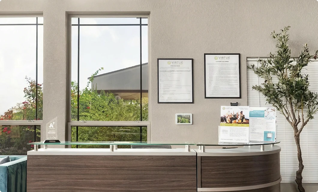 Bright, sunlit sitting room with large windows at the Killeen facility